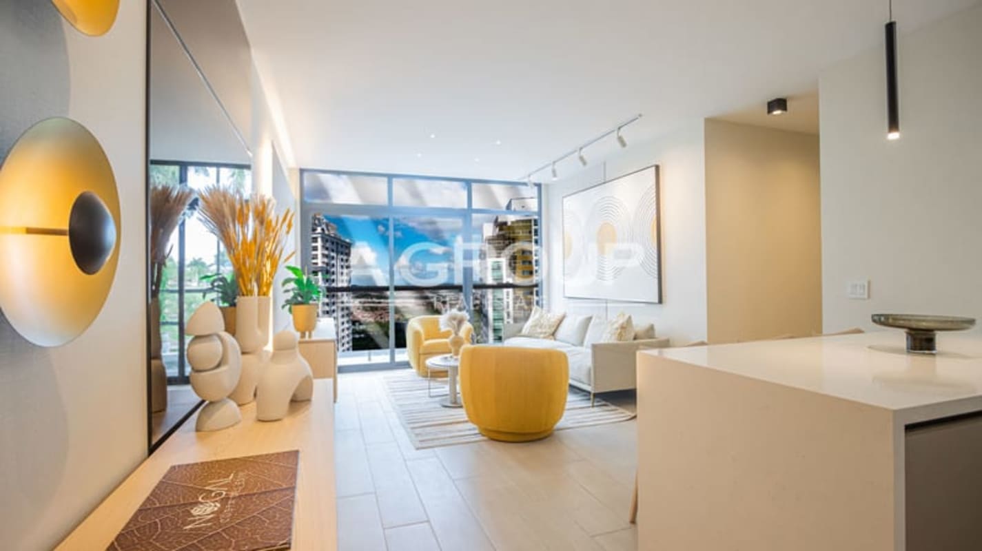 Spacious kitchen with quartz countertops, modern cabinetry, island in PH Nogal Costa del Este Panama