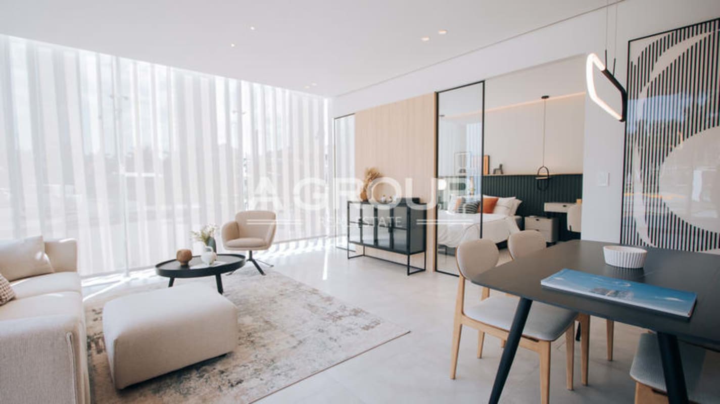 Bright open-plan studio apartment with glass divider and minimalist decor in Generation Tower Costa del Este