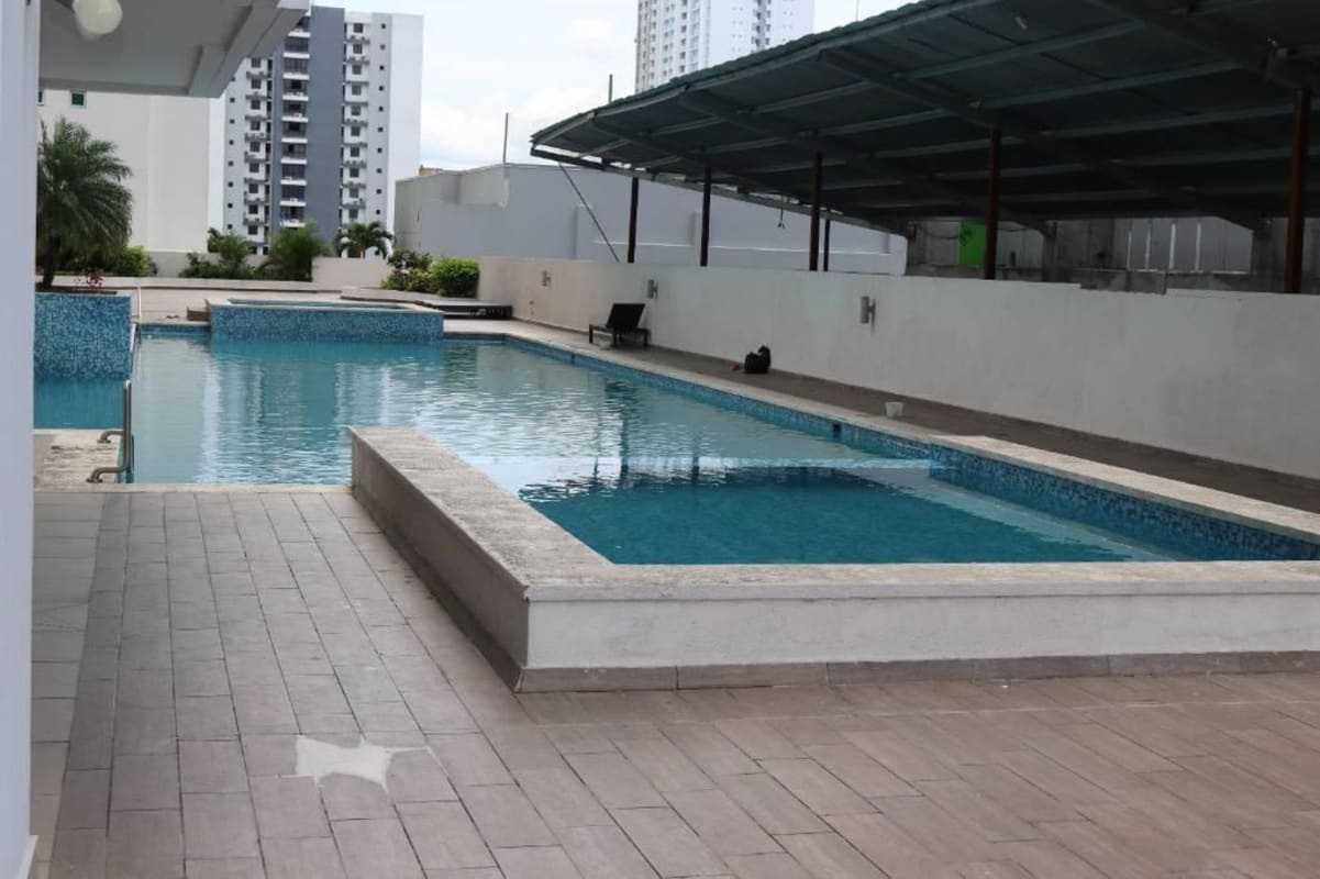 Aerial of pool, playground, green areas PH King Park Condado del Rey Panama