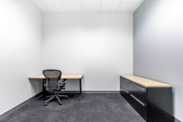Minimalist white office with large window ergonomic furniture PH Atlantic Plaza Colon