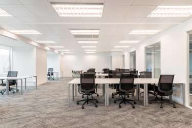 Bright office workspace with ergonomic chairs desks in PH Atlantic Plaza Colon Free Zone Panama