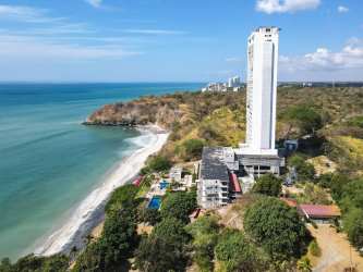 Living room with sofa, TV, panoramic sea view terrace access in PH El Palmar Residences San Carlos Panama