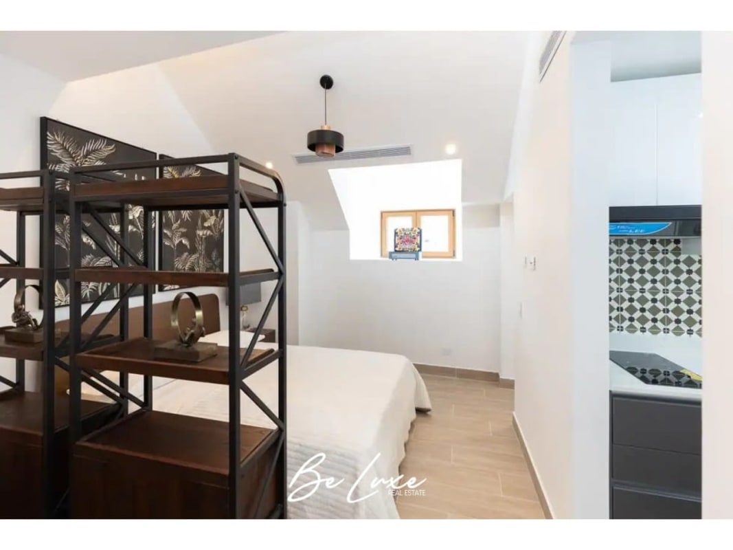 Kitchenette with modern fixtures and appliances at PH La Cuadra Casco Viejo Panama City