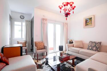 Kitchen with granite countertop and wood cabinetry at PH Tucan Country Club Panama