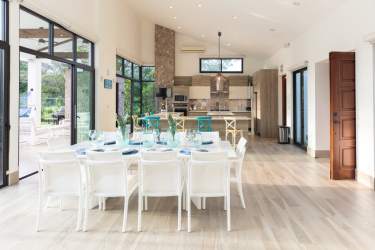 Outdoor swimming pool with jacuzzi and lush gardens Punta Barco Village beach property