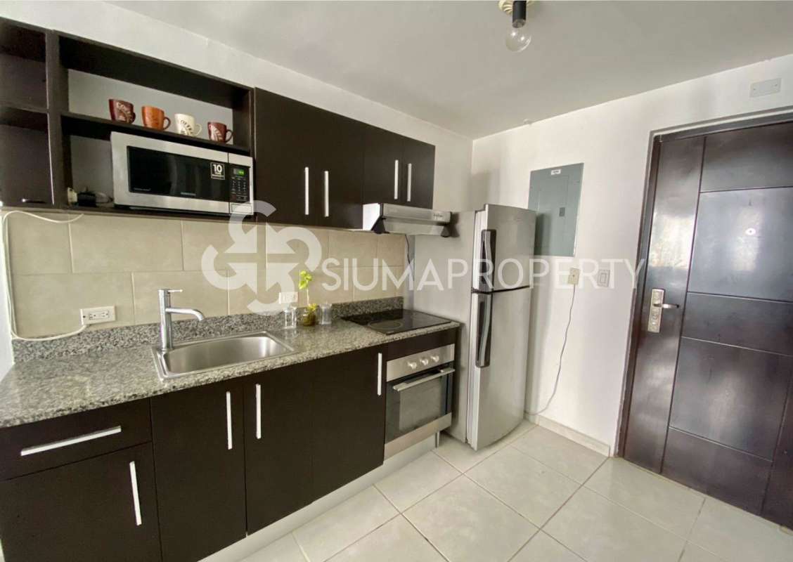 Master bedroom ensuite bathroom tile walls vanity at PH Bay View Panama apartment