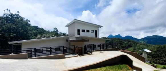Contemporary minimalist facade of mountain home overlooking valley in Altos del María Panama