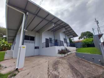 Exterior entrance fenced street view of rental complex in Veracruz Panama
