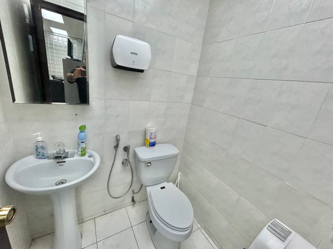 Reception with glass block wall counter inside commercial unit San Francisco Plaza Panama