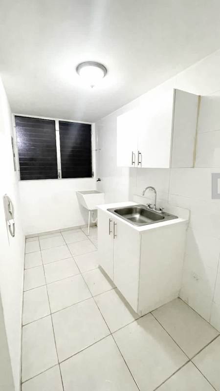 Laundry room with utility sink window natural light in PH Residencial Llano Bonito Panama City