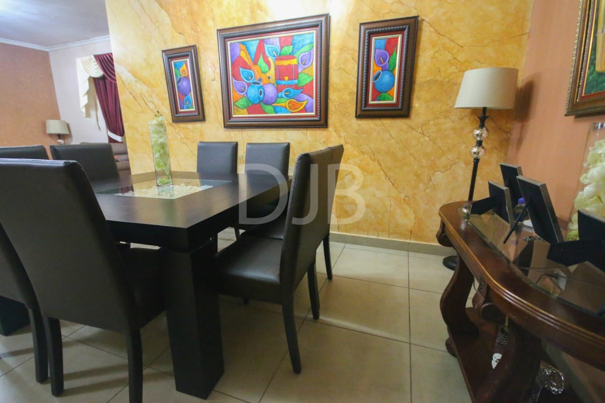 Swimming pool area with lounge chairs in PH Mont Blanc Brisas del Golf Panama City