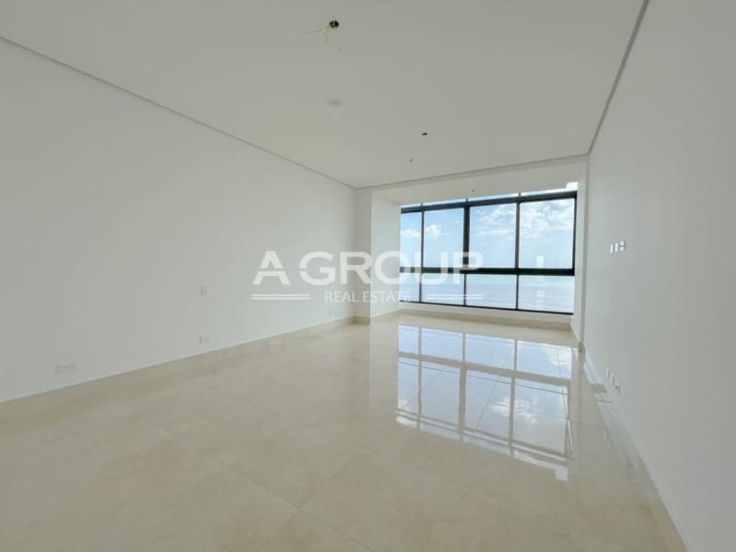 Modern bathroom with freestanding bathtub, mosaic tile accent wall oceanview window in PH Matisse Panama