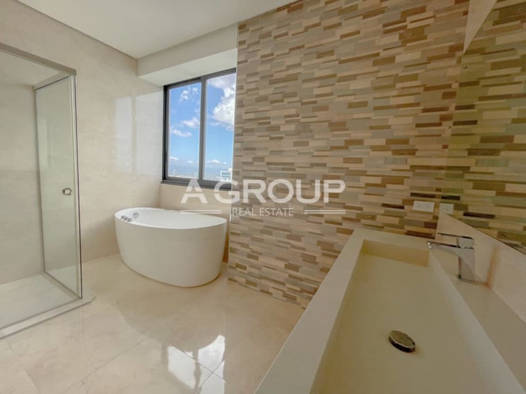 Open-concept main living area with floor-to-ceiling windows oceanfront view in Costa del Este Panama