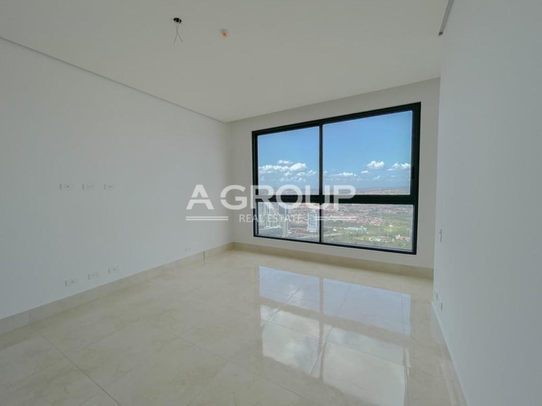 Contemporary bathroom with tile accent wall and glass shower PH Matisse Costa del Este