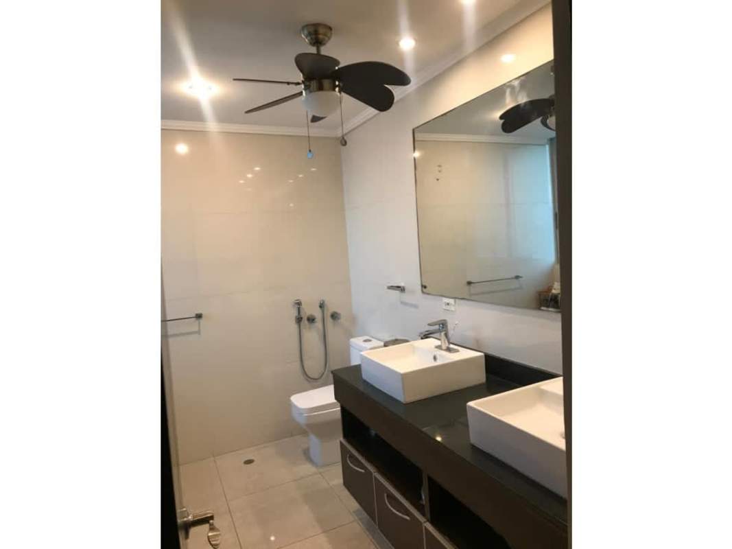 Modern kitchen with granite countertop island and stainless steel appliances in PH SF67 San Francisco Panama