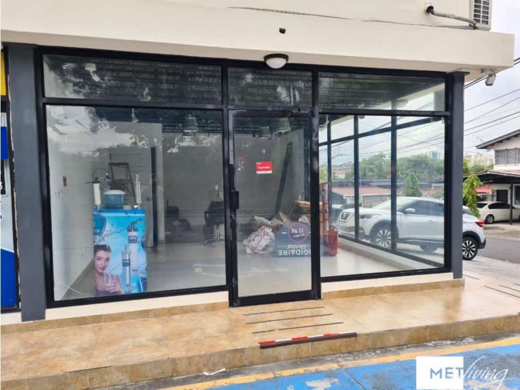 Empty interior room tiled floors white walls security camera Santa Elena Panama City