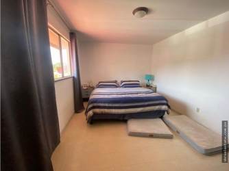 Bathroom with walk-in shower, ceramic sink, bright tile in Howard Panama Pacifico