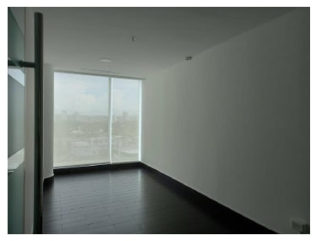 Multi-story BMW Plaza office tower with glass frontage on main commercial avenue Panama City