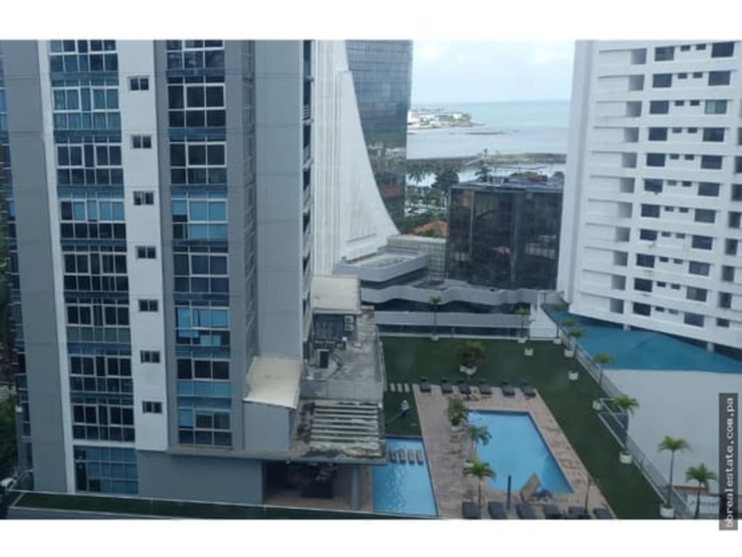 Open concept living and dining with tile floors in PH Belle View Avenida Balboa Panama City