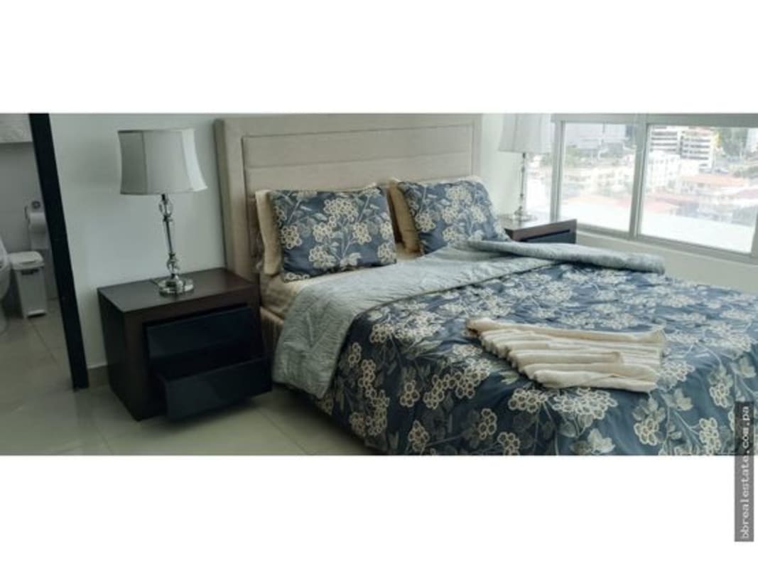 Bedroom with large window and cityscape vistas in PH Belle View Bella Vista Panama