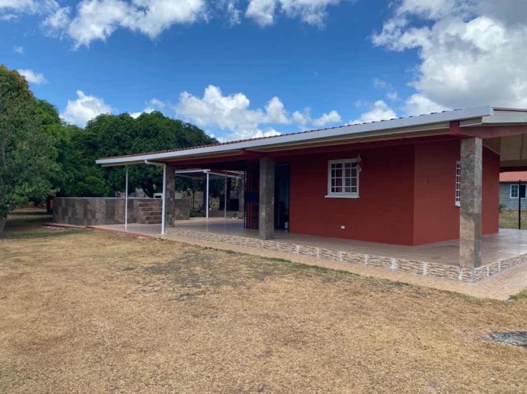 Large garden area with mature fruit trees surrounding rural home Pacora Panama