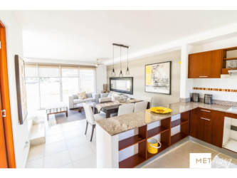 Bright modern open-concept living dining area with tile floors and ample natural light PH La Campiña Arraiján Panama
