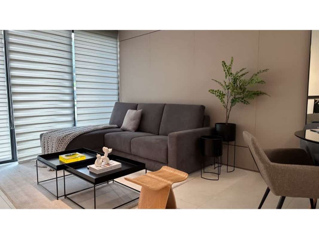 Master bedroom with large windows and skyline view at 5Cero4 Park and Residences Panama