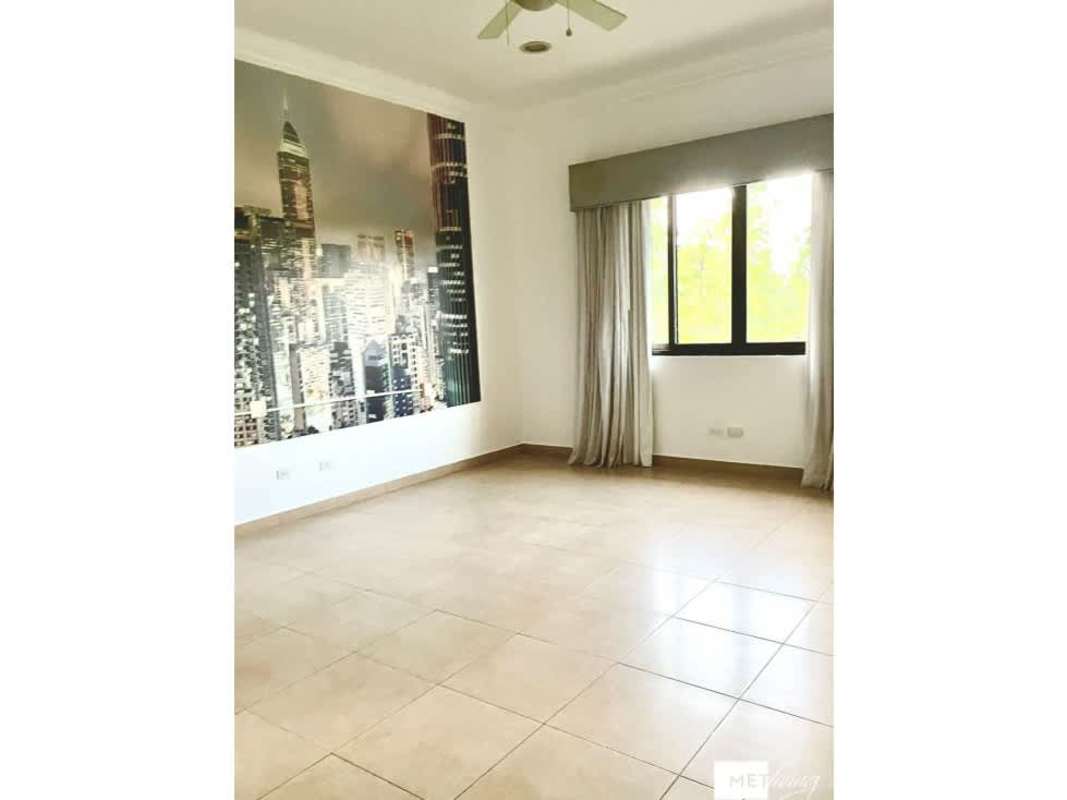 Bedroom with marble flooring, cityscape mural, ceiling fan, large window in Toscana Costa del Este