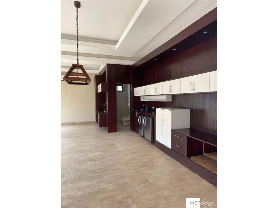 Spacious covered patio with ceiling fans, garden and pool views Costa del Este luxury home