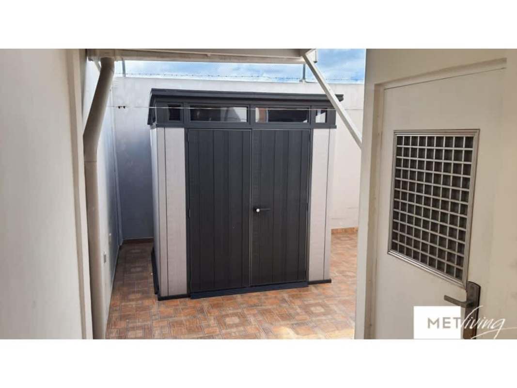 Small tiled backyard with detached shed PH Everest residential Panama