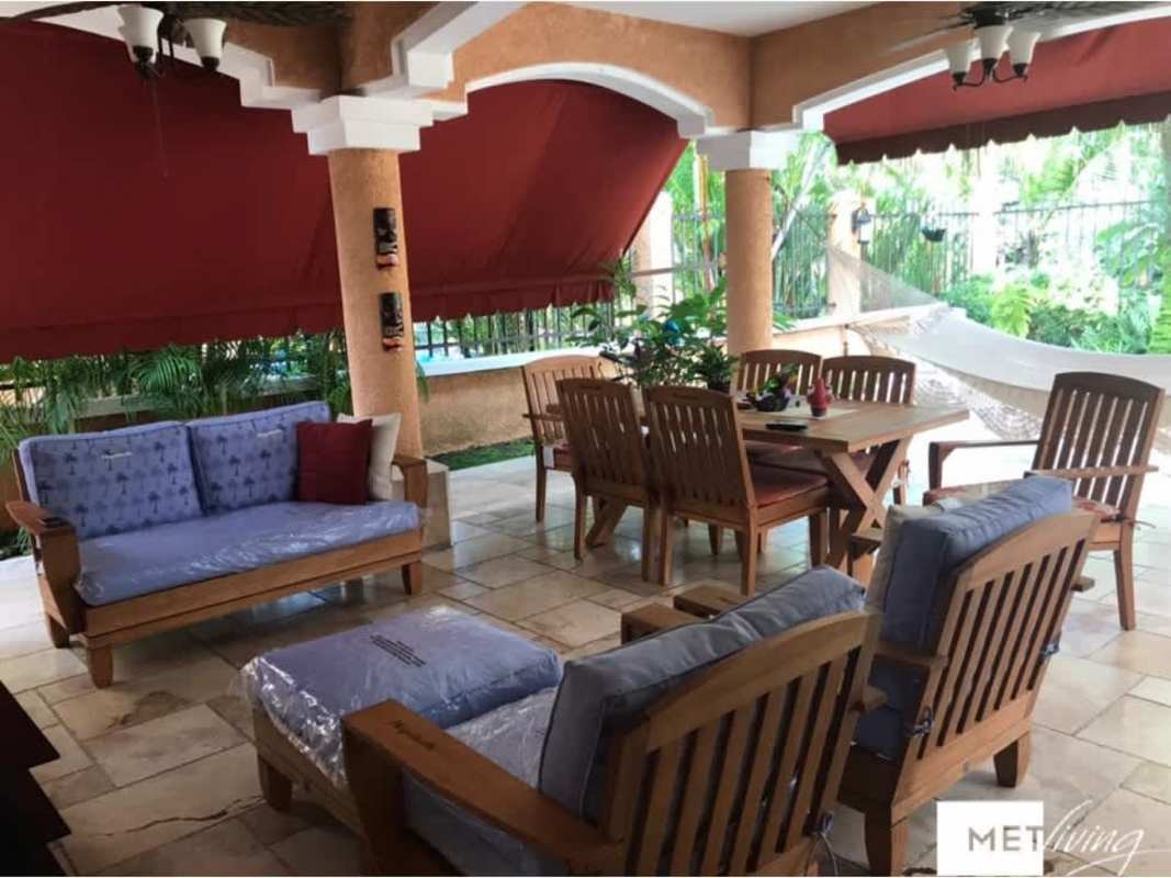 Covered patio with hammock, BBQ grill, tropical plants, private pool at Clayton Village house Panama