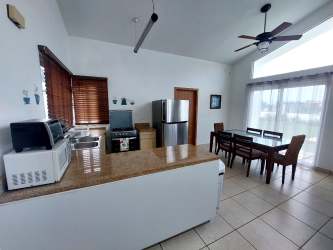 Spacious bedroom with closet AC large windows in modern Playa Malibu villa