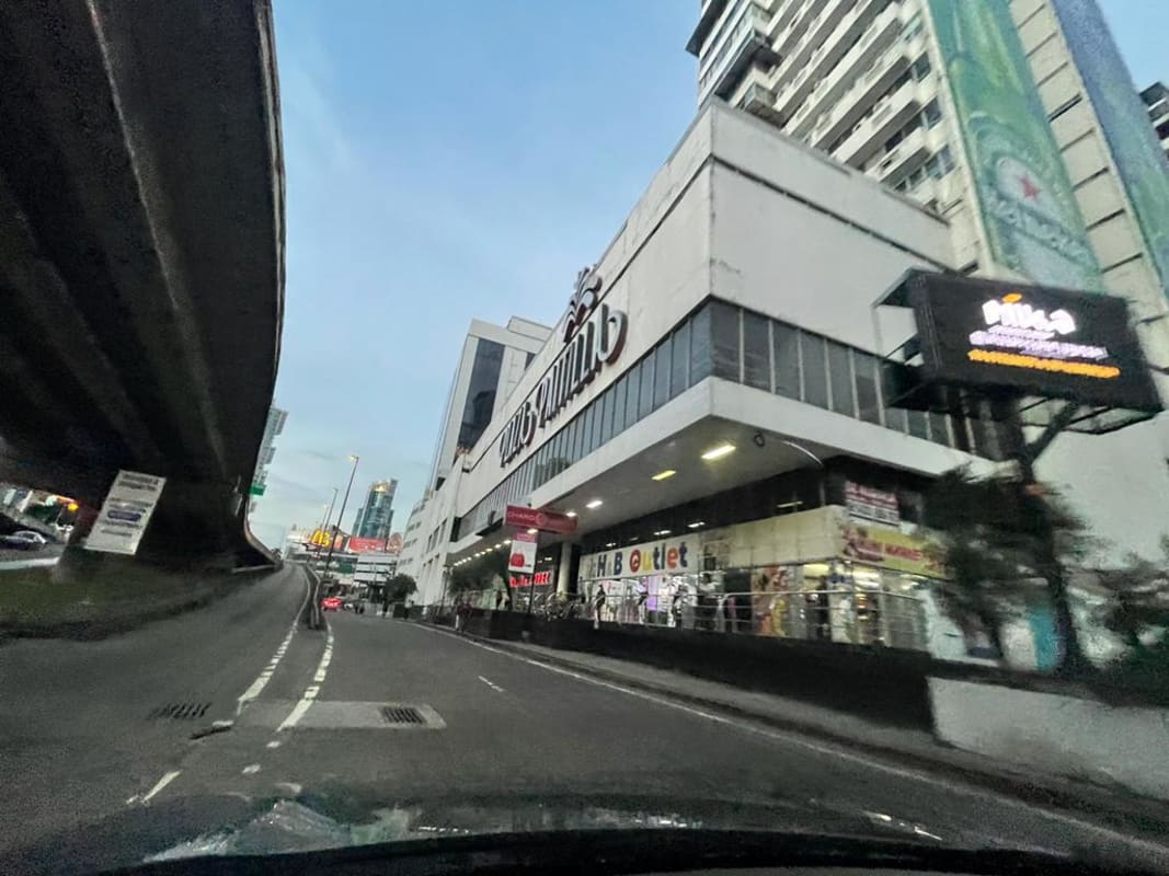 Exterior of commercial building with street-level shops and office spaces in Punta Paitilla Panama City