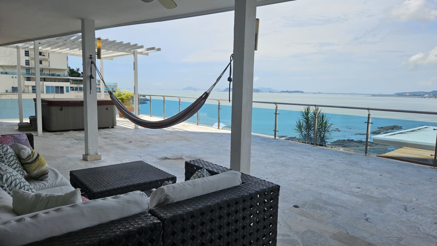 Expansive terrace with jacuzzi overlooking Pacific Ocean skyline PH Aqualina Panama City