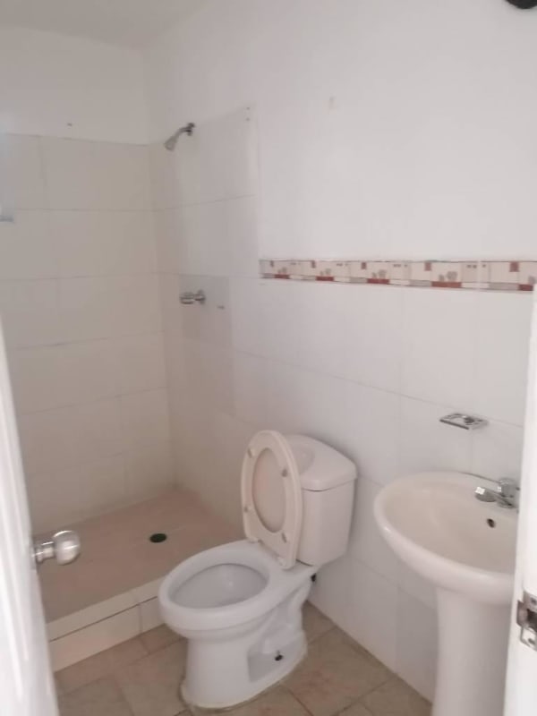 Basic kitchen with countertop sink and tile backsplash PH Altos de Primavera Villa Lucre Panama