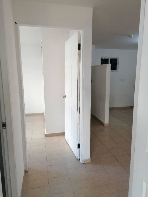 Simple bathroom with shower toilet sink tiled walls PH Altos de Primavera Panama City