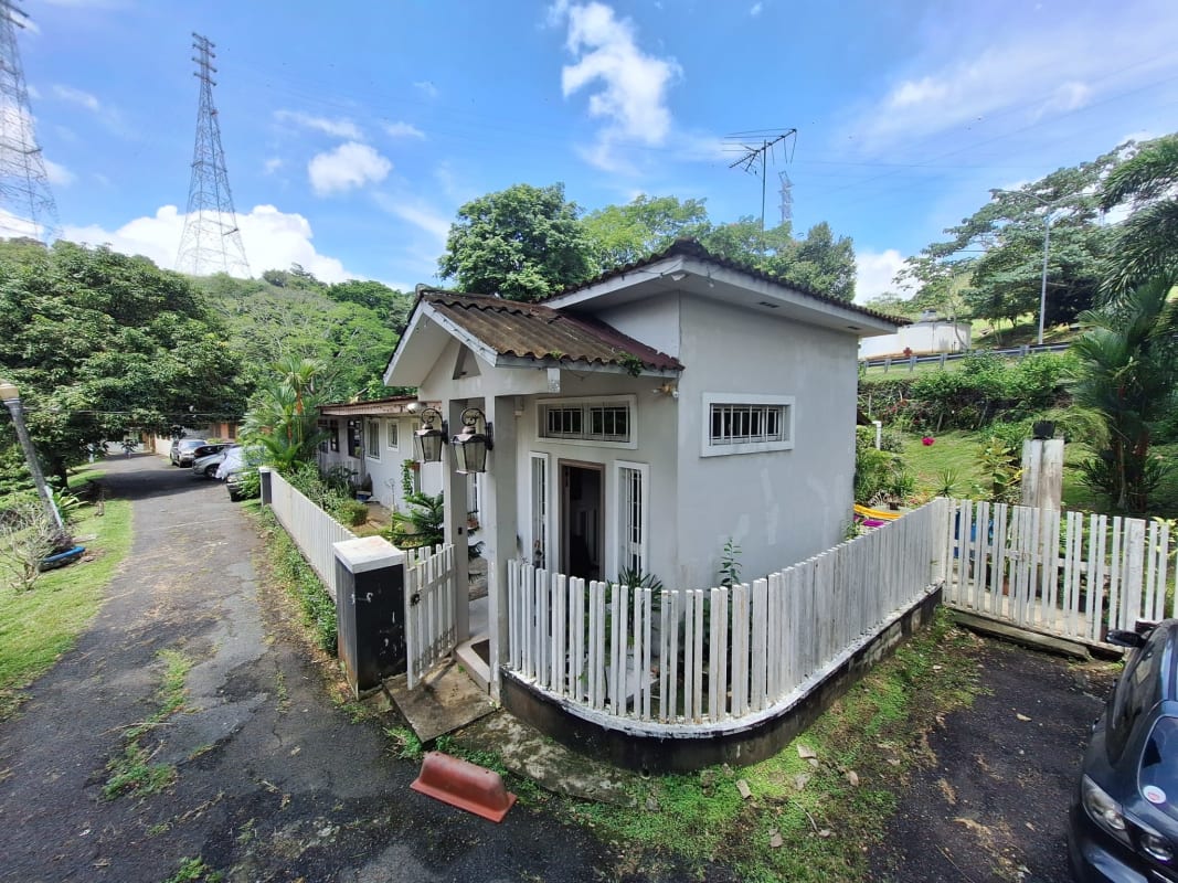 Contemporary bathroom with dark tile walk-in shower, bright natural lighting in house at Ancón Panama