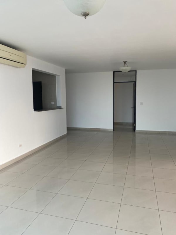 Spacious balcony with glass railing and panoramic city view at PH Regent San Francisco Panama