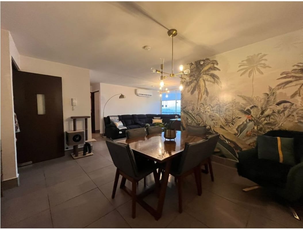 Modern open-plan living dining area with tile floor and neutral colors in PH Parques del Carmen Panama