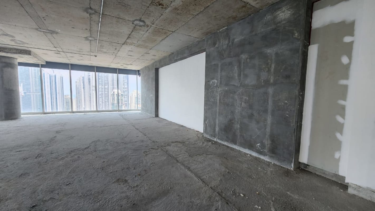 Unfinished shell office floor with panoramic floor-to-ceiling windows at Oceania Business Plaza Punta Pacifica