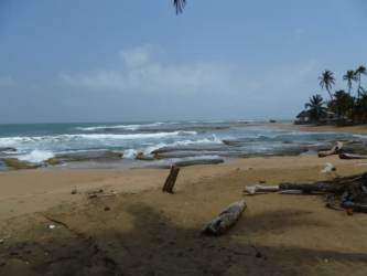 Rural road passing lush hillside by development property for sale Costa Arriba Colon Panama