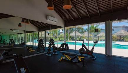 Open modern kitchen with granite countertops inside Paradise Point Coronado beach villa Panama