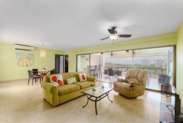 Modern kitchen with marble countertops open layout in Punta Barco Resort condo for sale Panama