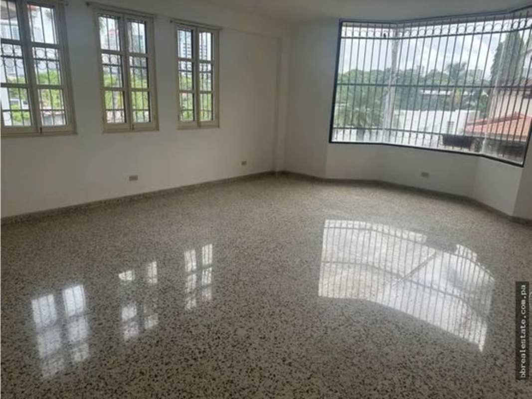 Spacious covered patio with terracotta roof, garden views in Altos del Golf Panama