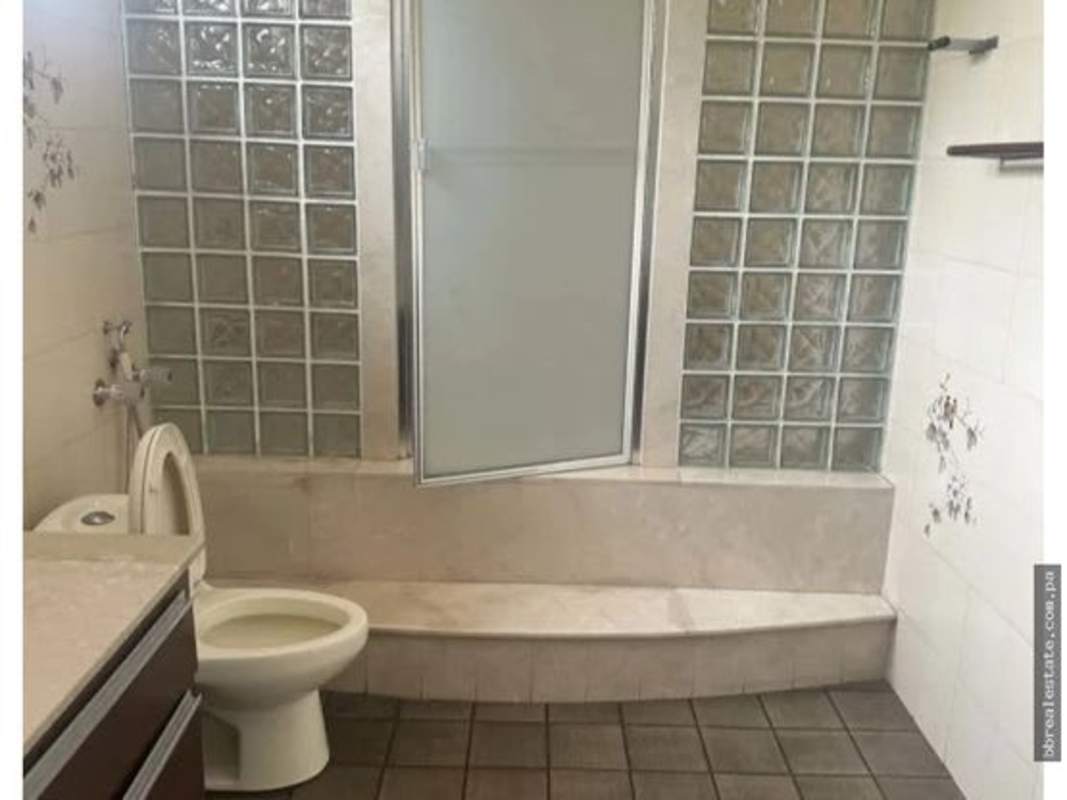 Bright bathroom with glass shower and modern fixtures Altos del Golf Panama