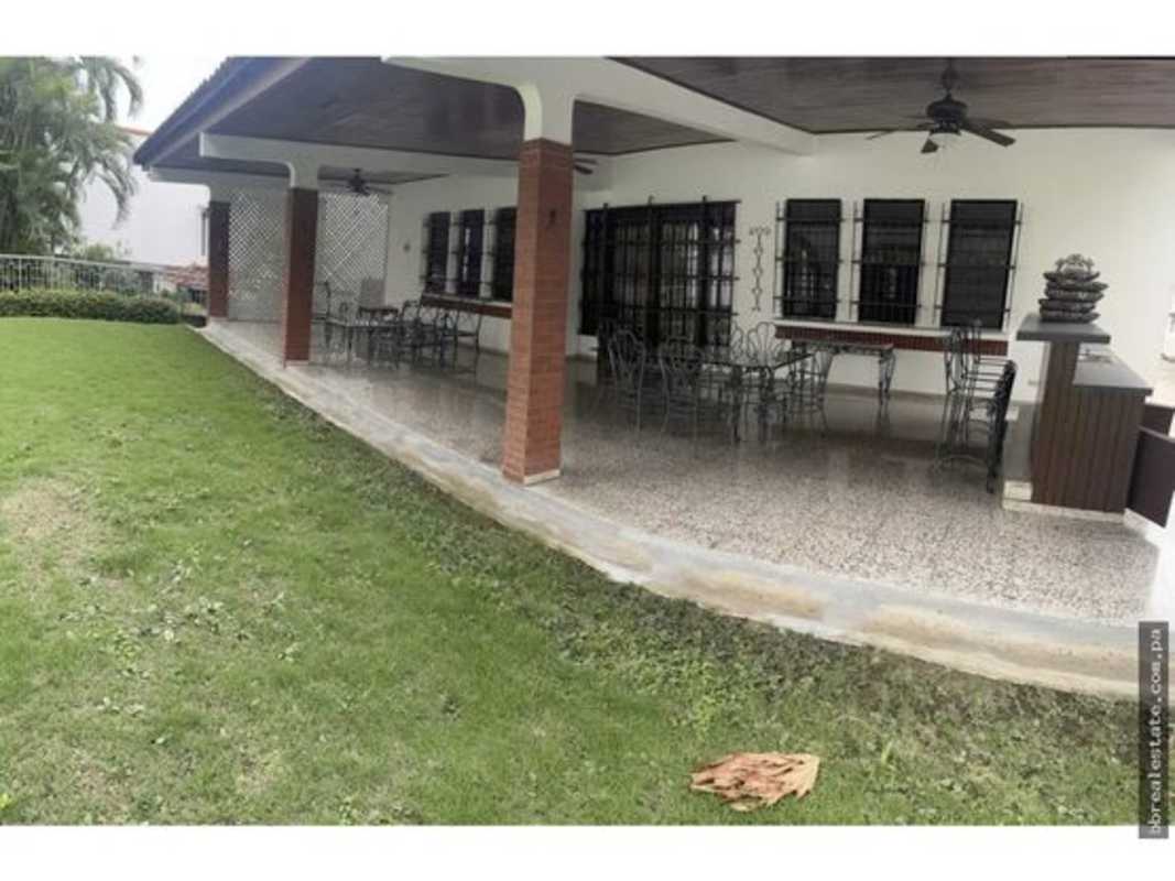 Contemporary bathroom with glass block shower wall and tub in Altos del Golf Panama City