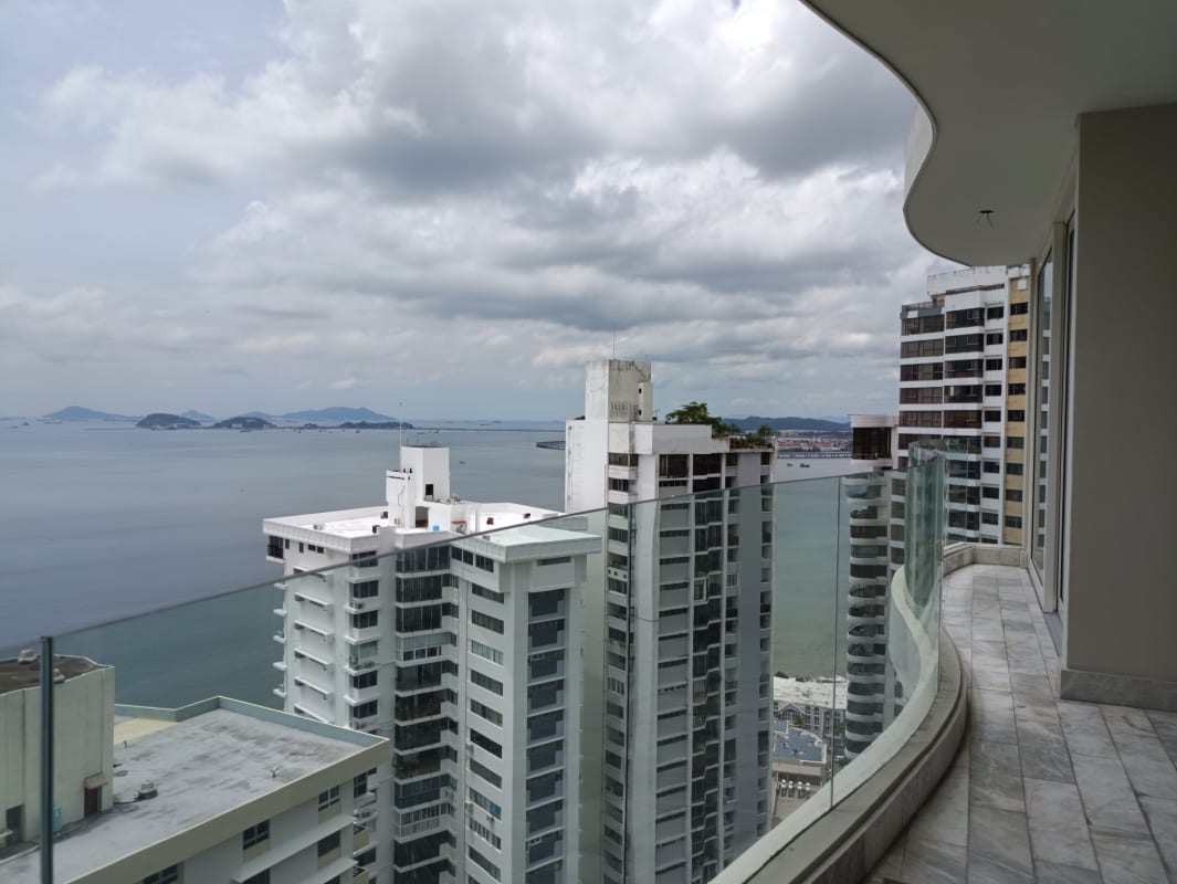 Spacious marble floor living area with large windows and ocean views at The Towers Punta Paitilla Panama