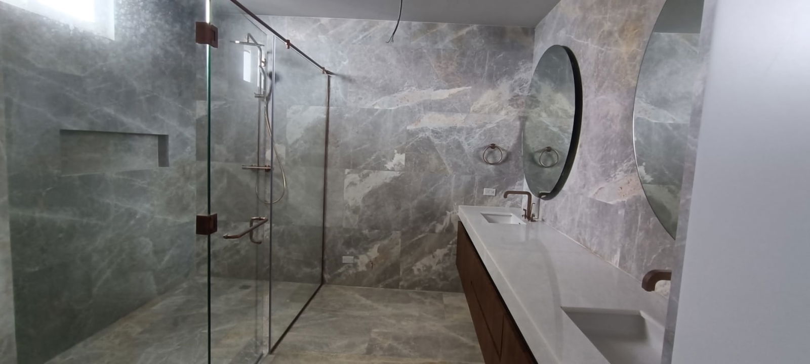 Modern kitchen island marble countertops cabinets ocean view The Towers Punta Paitilla Panama