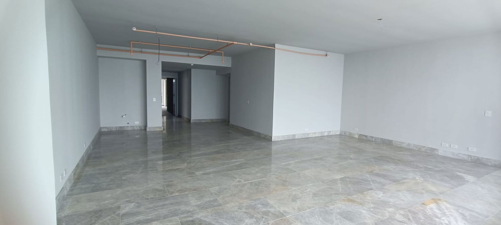 Spacious open-plan interior with marble floors in luxury condo at The Towers Punta Paitilla Panama