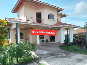 Two-story Mediterranean style house with balcony, tiled roof, garden in Terronal David Panama